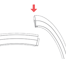 Løs reim med en pil som viser hvordan man skal skyve reimen ned i sporet til armbåndet